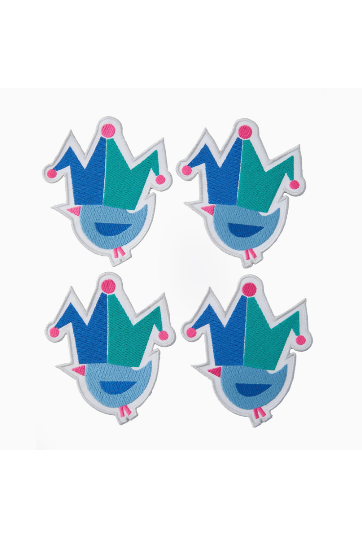 Four blue and green crown-shaped stickers on a white background