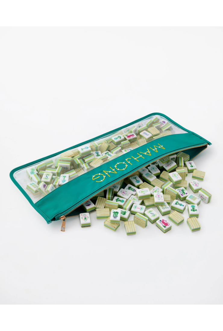 Set of Scrabble tiles with a teal pouch on a white background