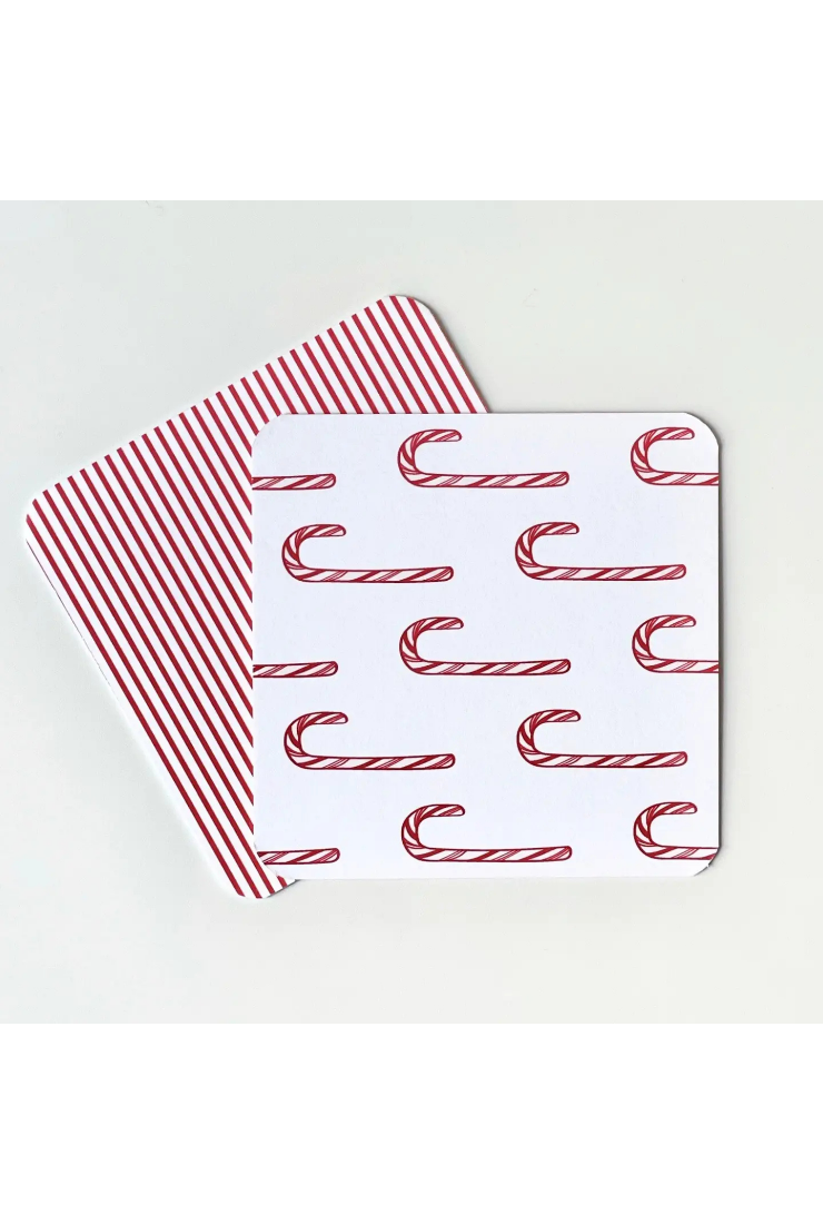 A set of square coasters with rounded corners, featuring a red and white candy cane pattern on one side and red and white diagonal stripes on the other, displayed on a light gray background.
