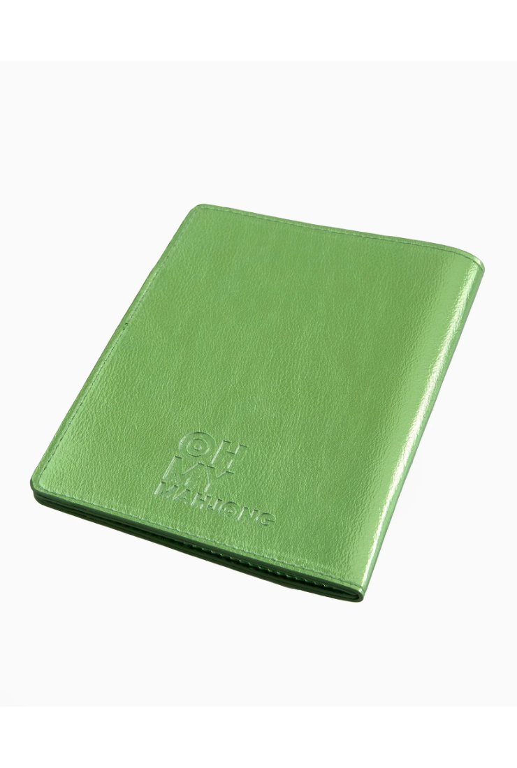Green leather wallet with branding on a white background