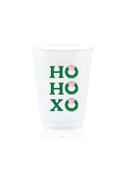 A white disposable plastic cup featuring a green and pink holiday graphic that reads 'HO HO XO' with wreath designs, shown on a plain white background.