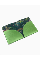 Green cardholder with patterned flap on a white background