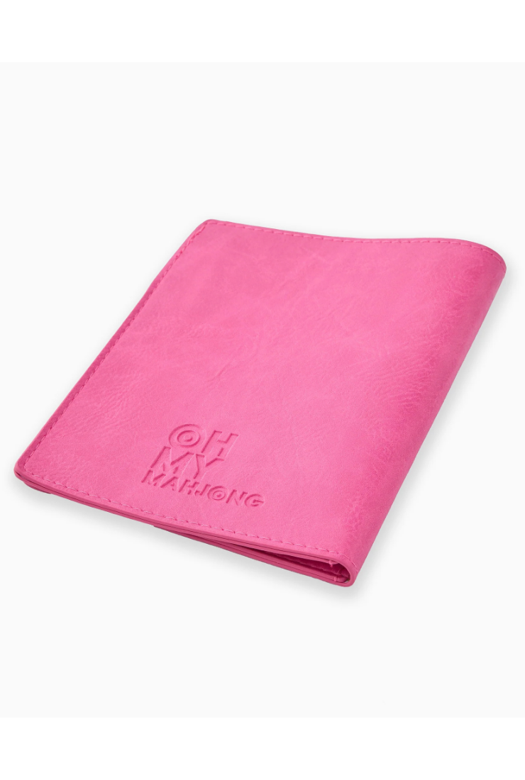 Pink notebook with text on a white background