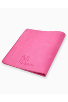 Pink notebook with text on a white background