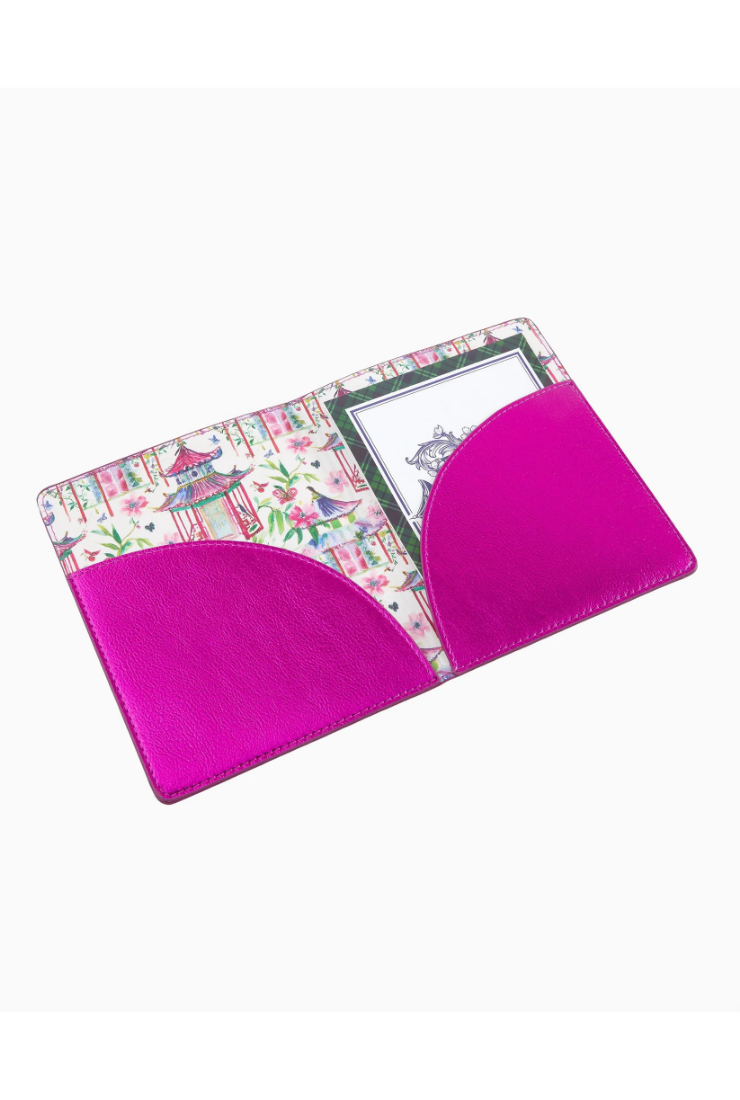 Pink tablet case with colorful design on a white background