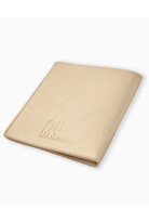 Beige notebook with 'Oh My Momo' branding on a white background