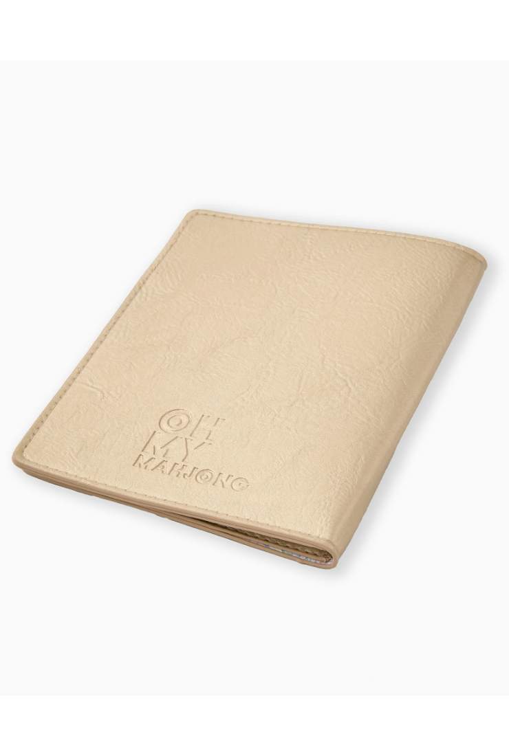 Beige notebook with 'Oh My Momo' branding on a white background