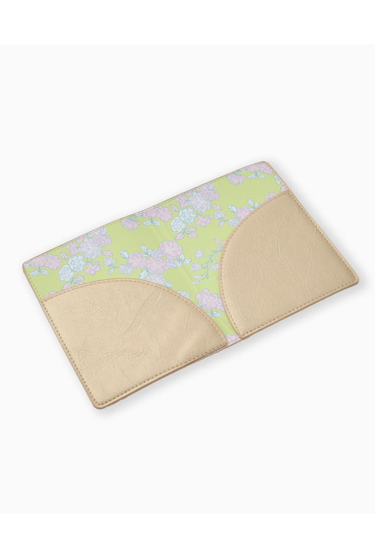 Floral patterned cushion with beige border on a white background