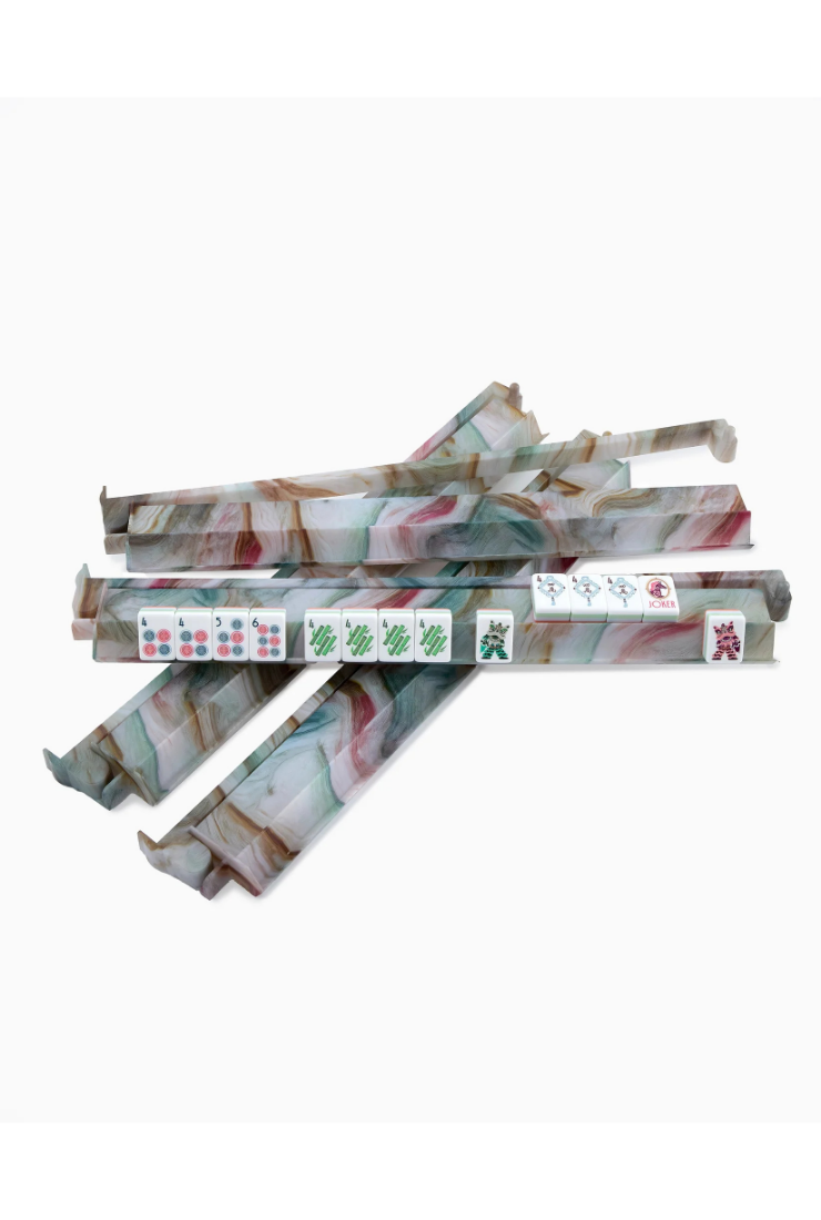 Stack of rolled-up papers with visible text on a white background