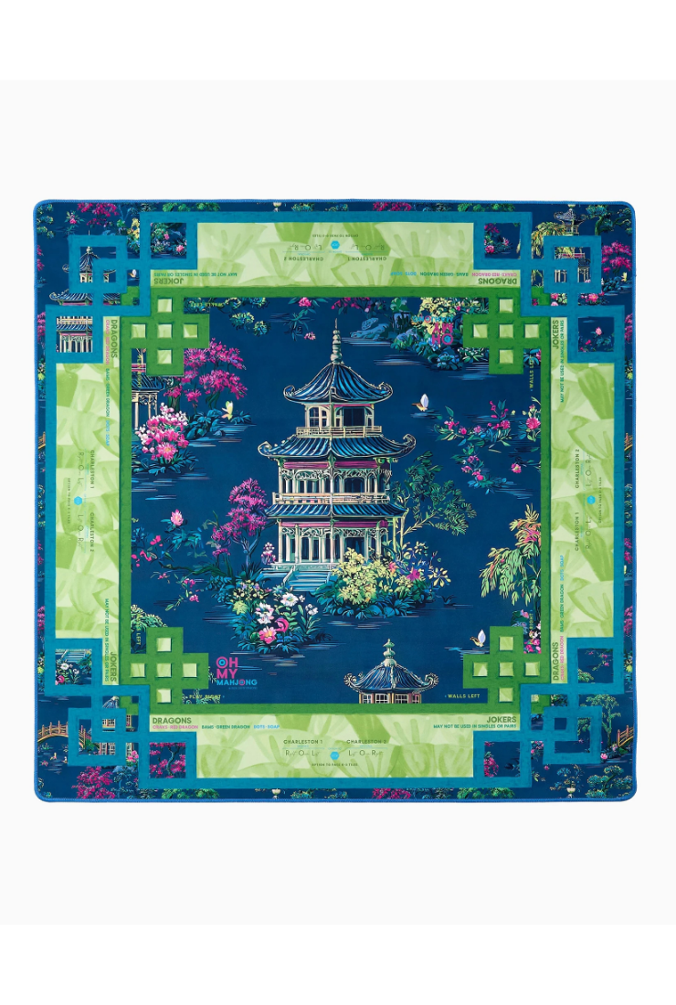 Decorative tablecloth with a Chinese pagoda design on a blue background