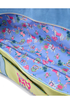 Colorful fabric with a pattern of cartoon characters on a blue background