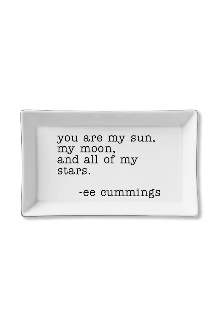 White rectangular plate with a black text quote on a white background