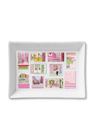 A white rectangular ceramic serving platter with rounded corners, featuring a collage of pink and multicolor illustrations of boutique storefronts and signs.