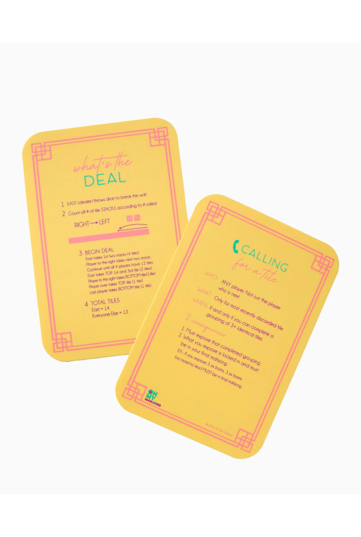 Two yellow rectangular cards with rounded corners, featuring pink decorative borders and printed text, shown on a plain white background.