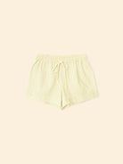 Light yellow ribbed shorts on a matching background