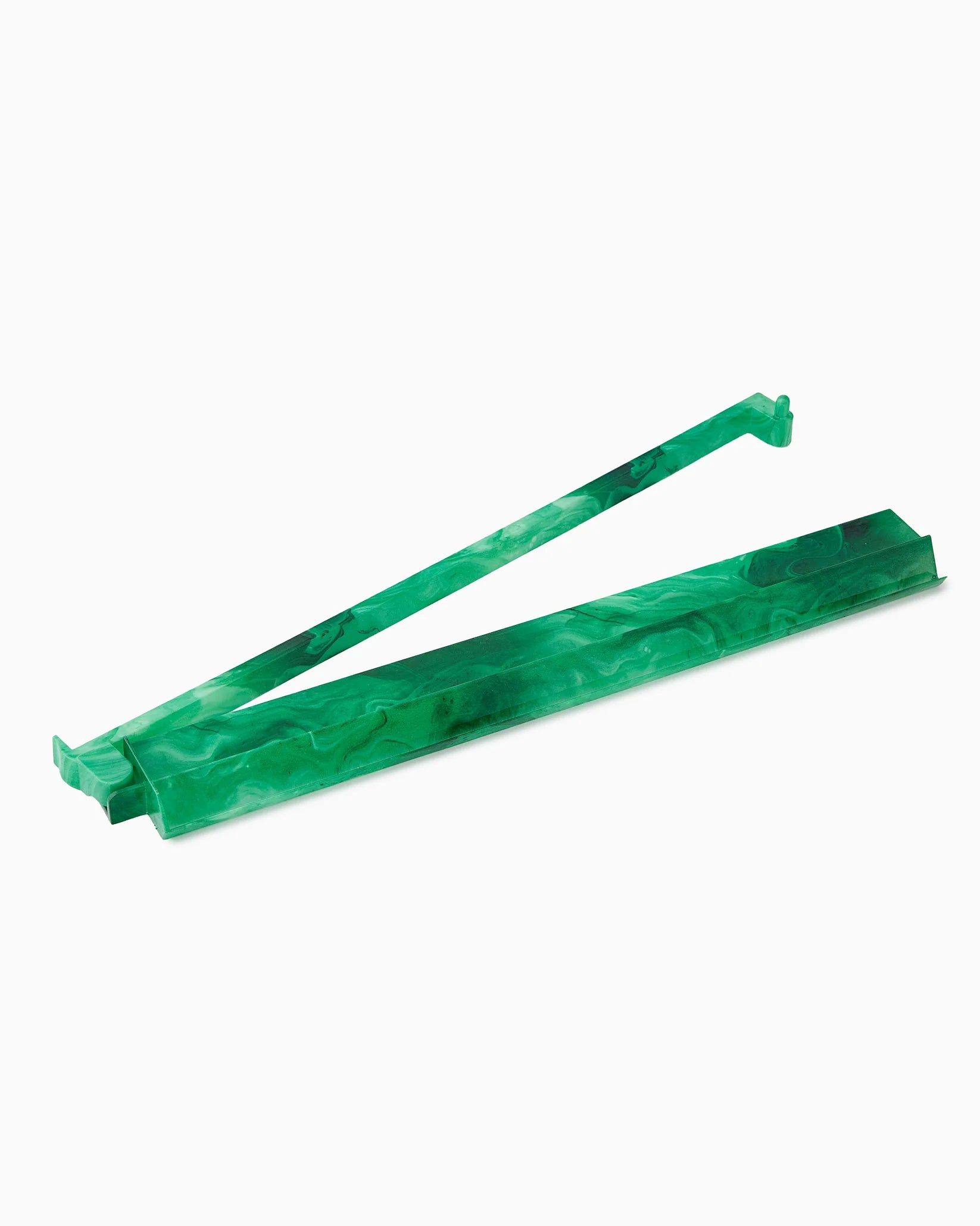 Two green plastic straws on a white background