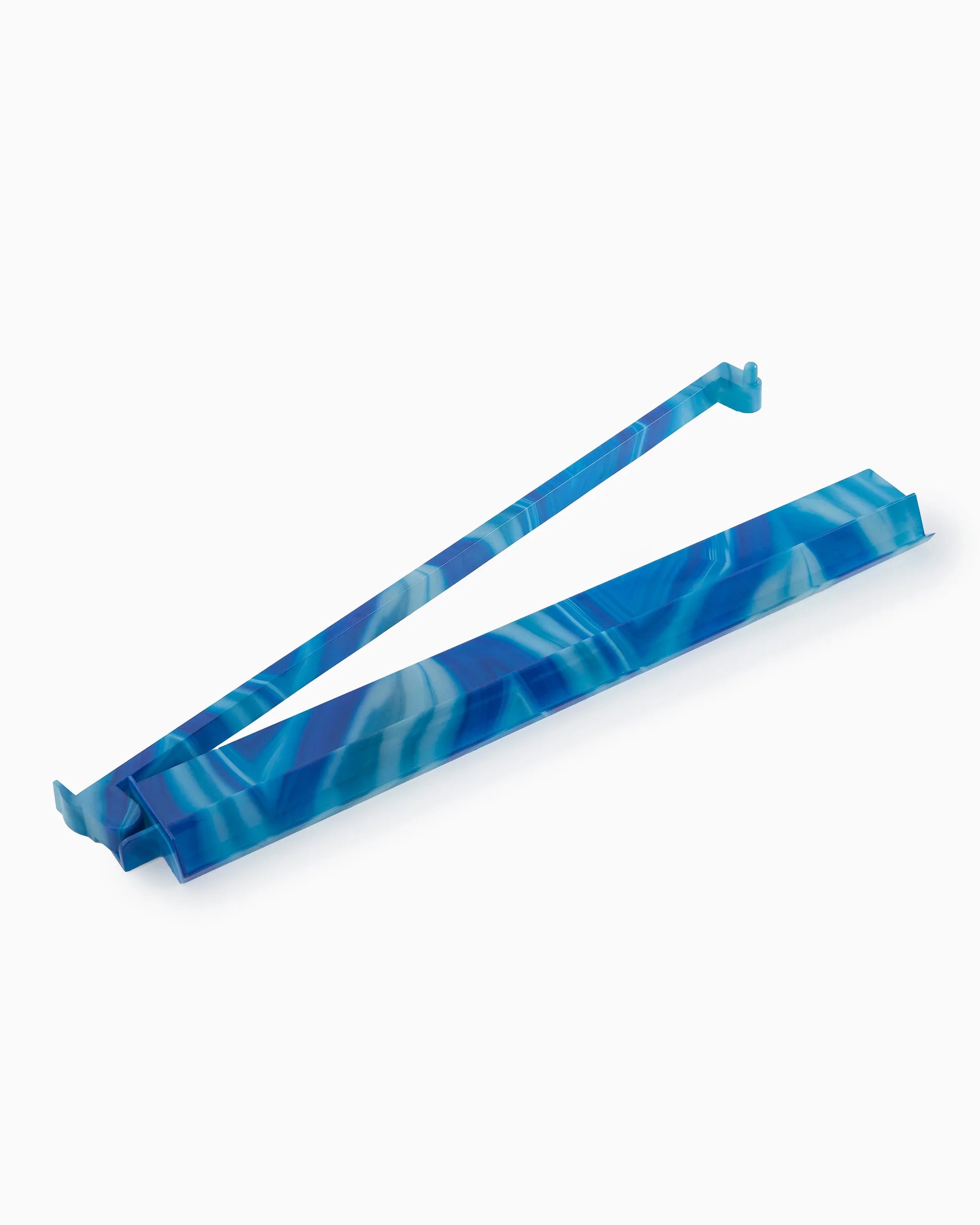 Blue and white patterned plastic tool on a white background