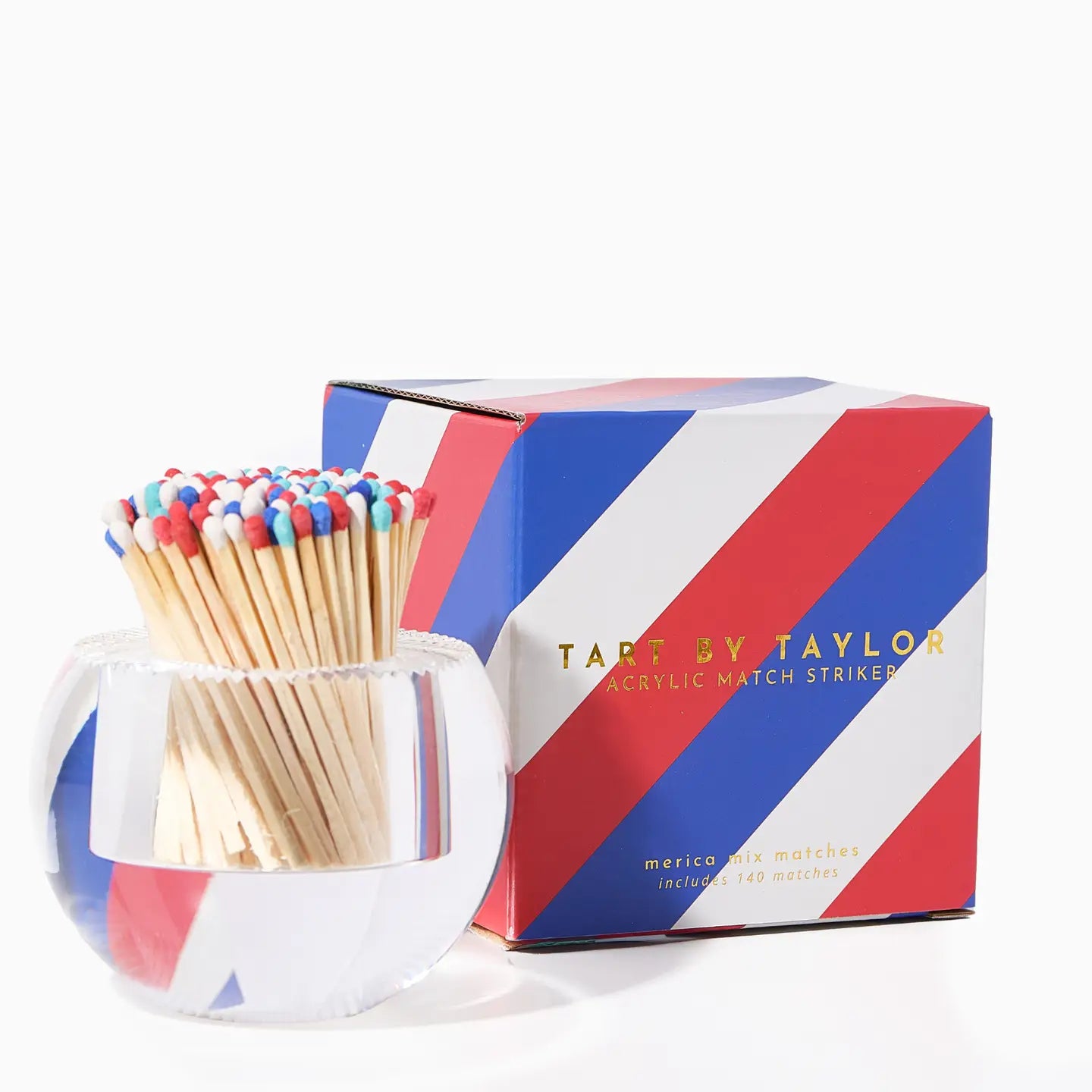 Match striker with colorful matches and striped packaging on a white background