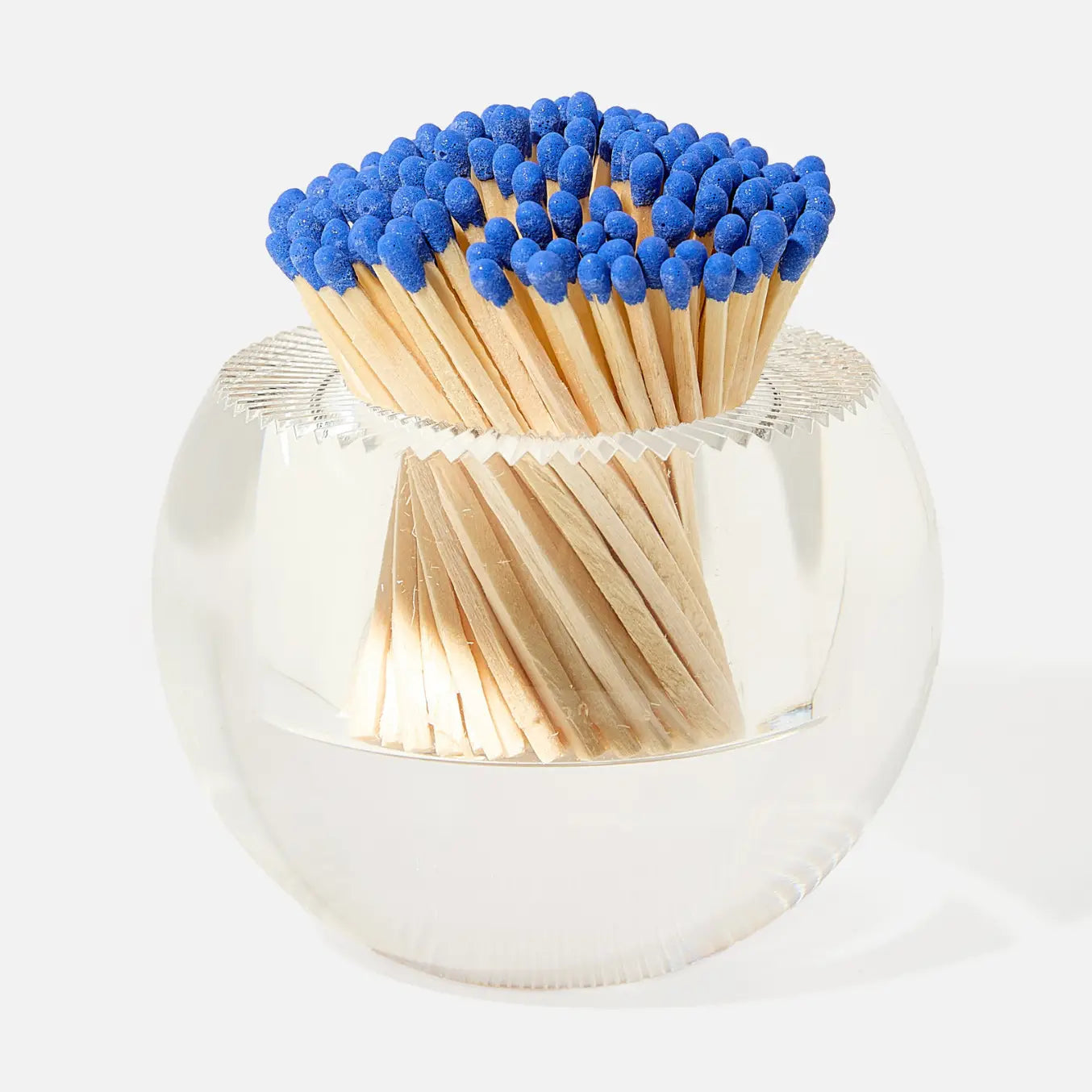 Matches with blue tips in a metallic holder on a white background