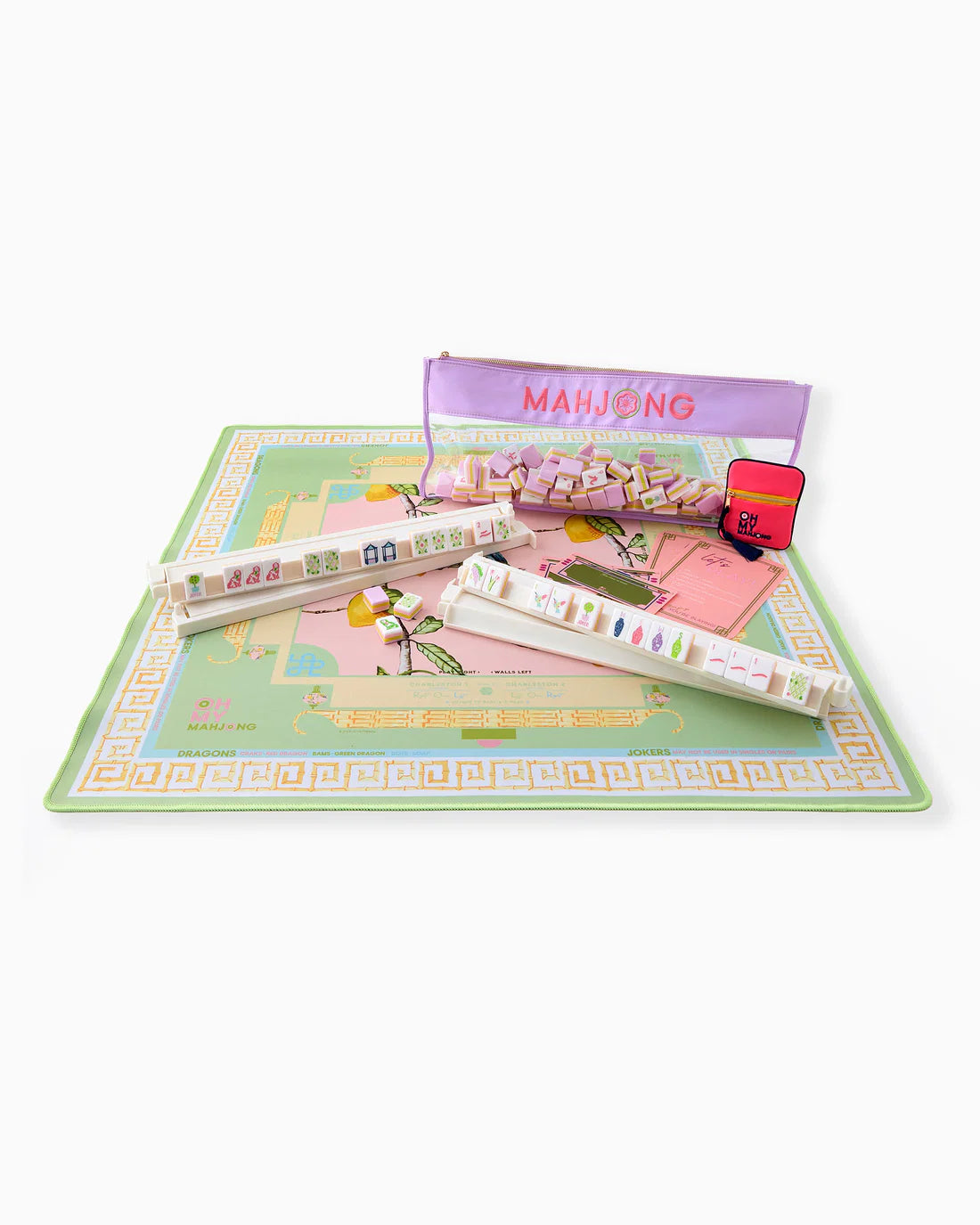 Mahjong game set with tiles and instructions on a white background