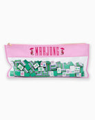 Pink pouch with green and white mahjong tiles on a white background