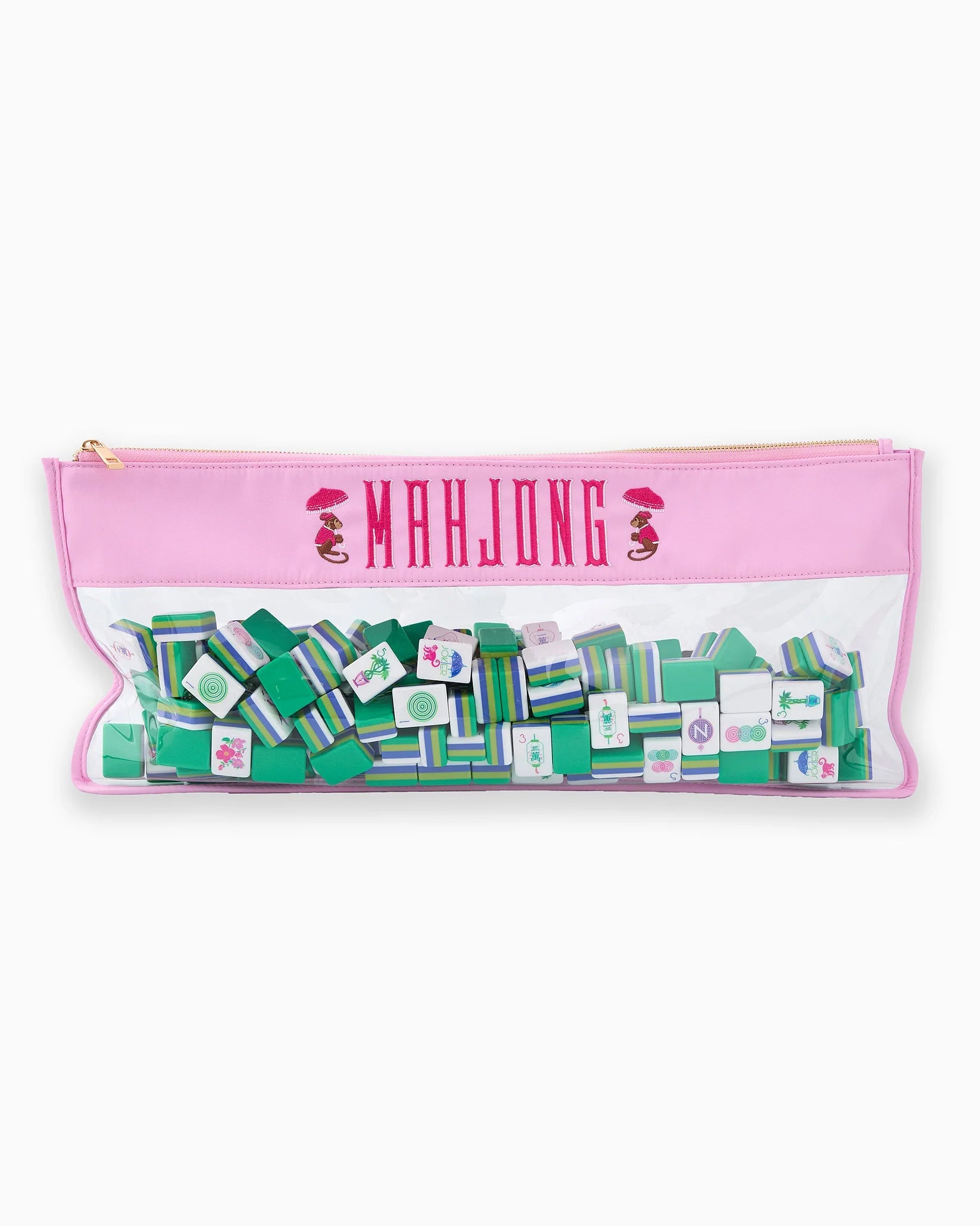 Pink pouch with green and white mahjong tiles on a white background