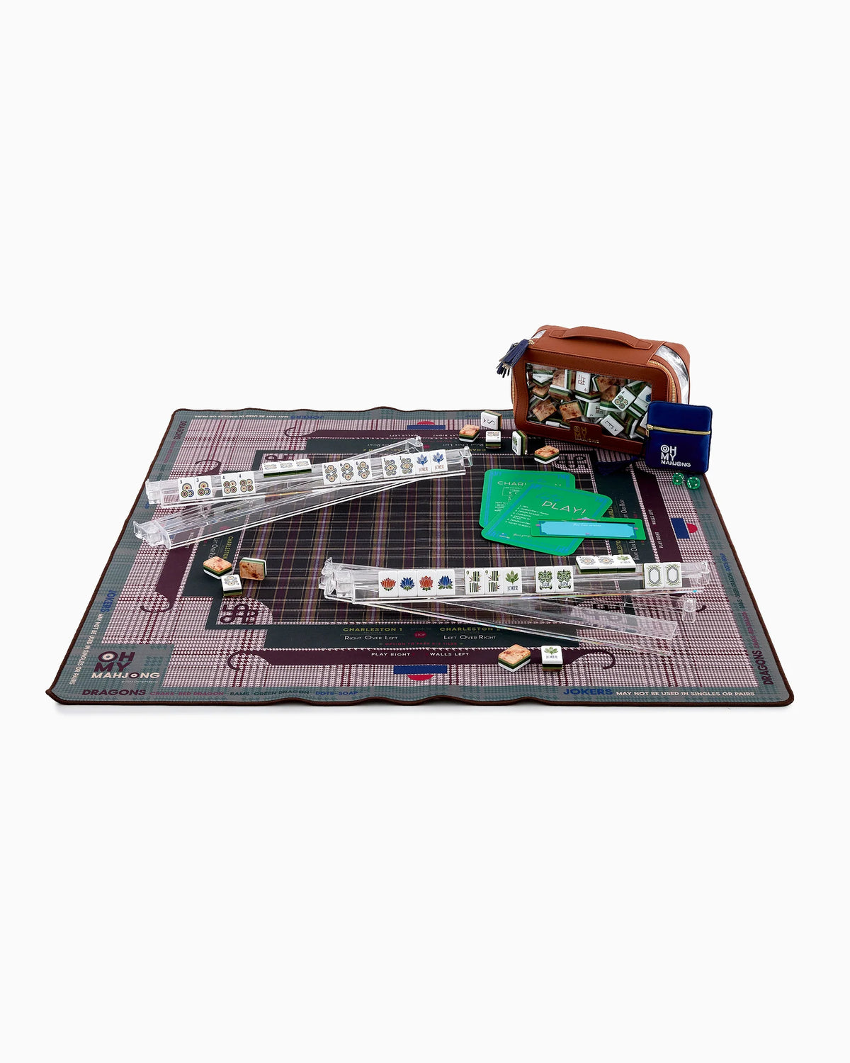Board game setup with components on a large mat