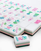 Decorative game pieces with colorful designs and 'Joker' text on a white background