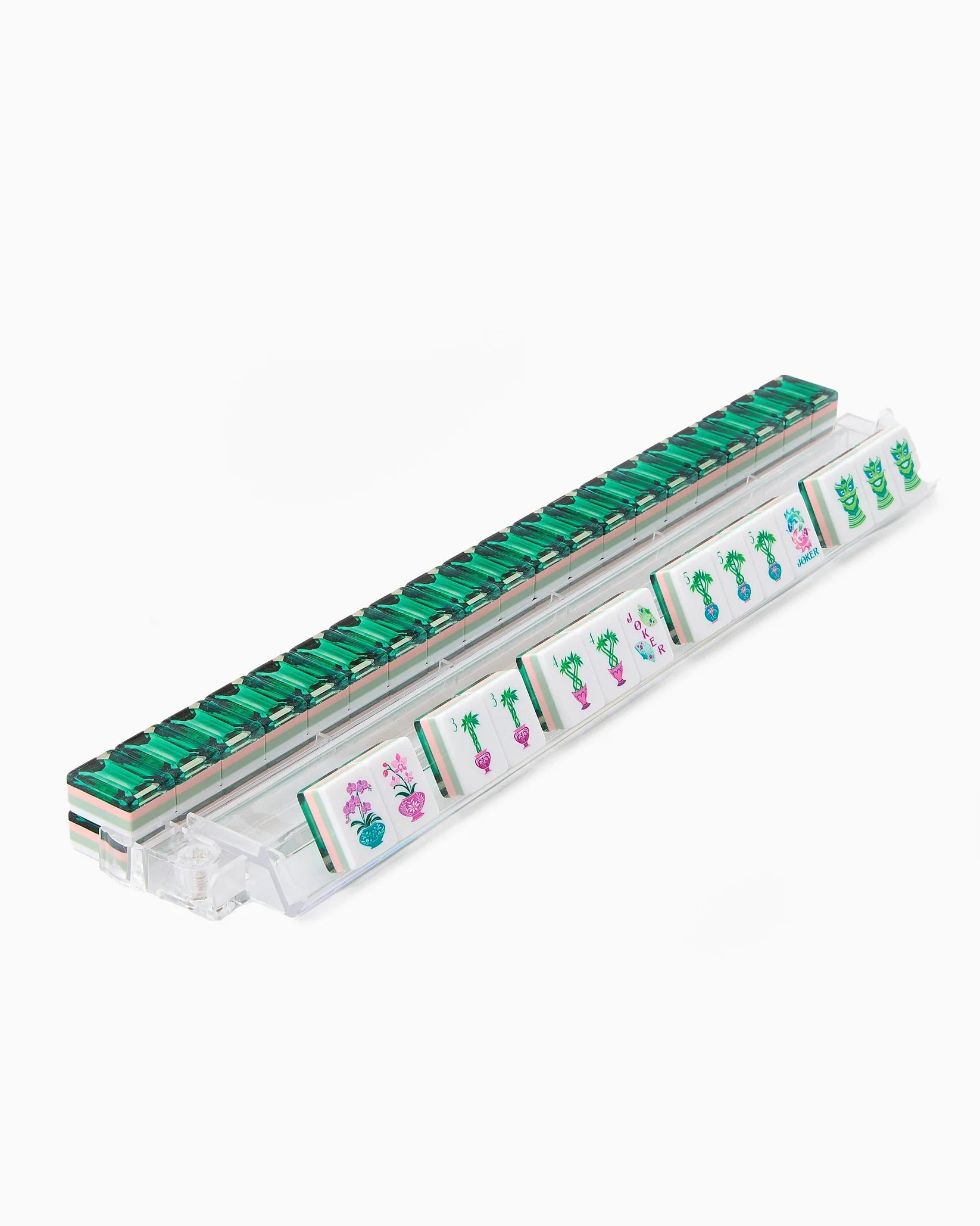 Magnetic tile set with green and white tiles on a white background