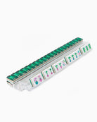Magnetic tile set with green and white tiles on a white background