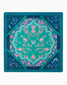 Decorative square mat with floral and geometric design on a white background