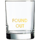 Clear glass with 'FOUND OUT' text in gold on a white background