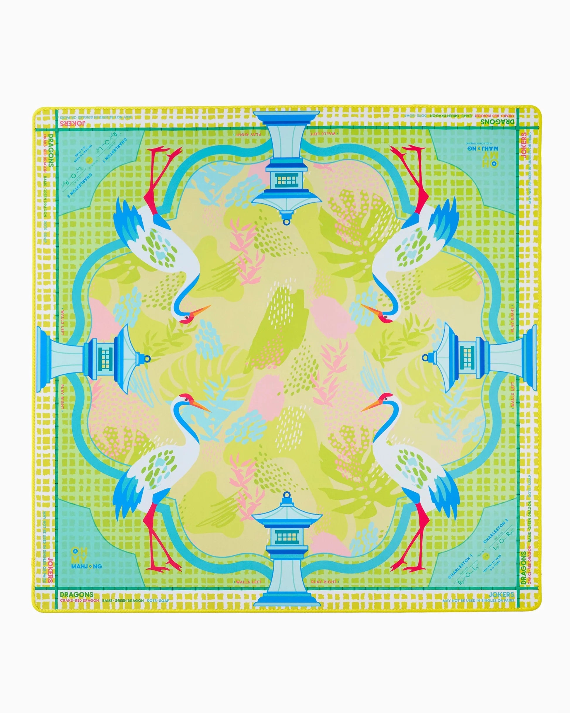 Colorful placemat with bird and pagoda design on a white background