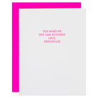 Card with pink border and humorous text about menopause on a white background