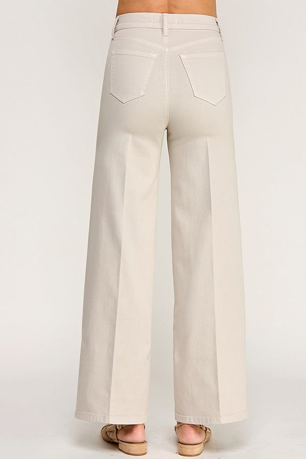 Beige wide-leg pants on a white background