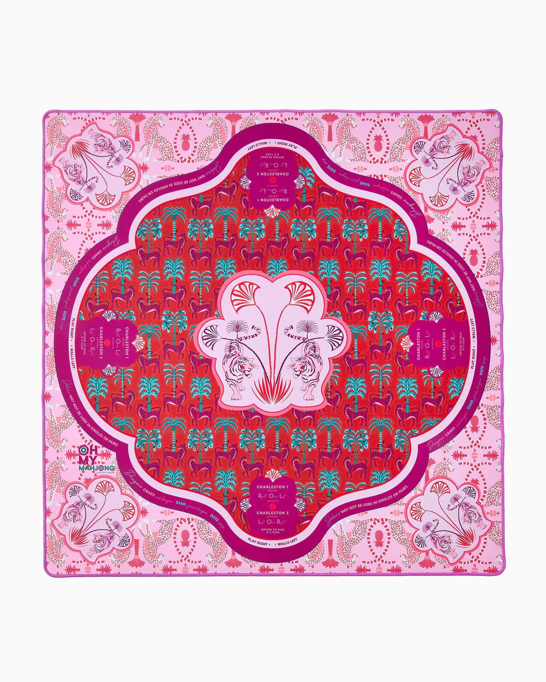 Decorative pink and red patterned tablecloth with central design