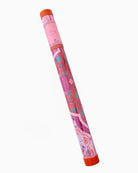 Pink and orange cylindrical product with decorative design on a white background