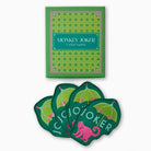 Green cocktail napkins with pink monkey design and 'Monkey Joker' branding on a white background.