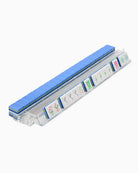 Rectangular product with blue top and clear bottom displaying colorful labels on a white background