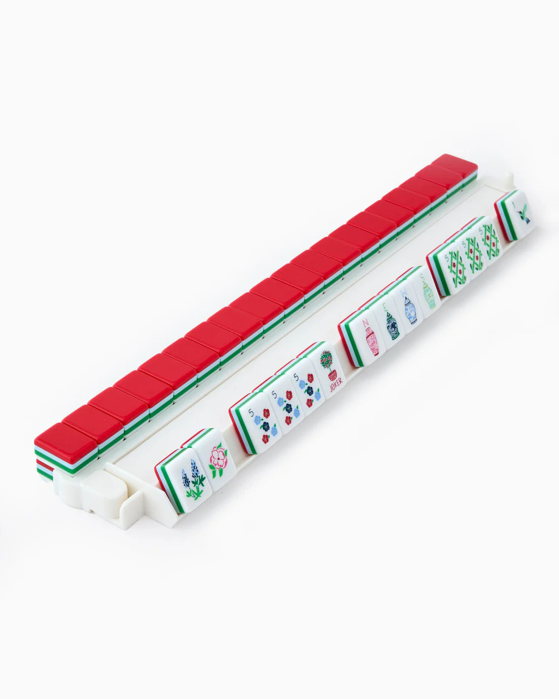 Magnetic tile set with red top and colorful tiles on a white background