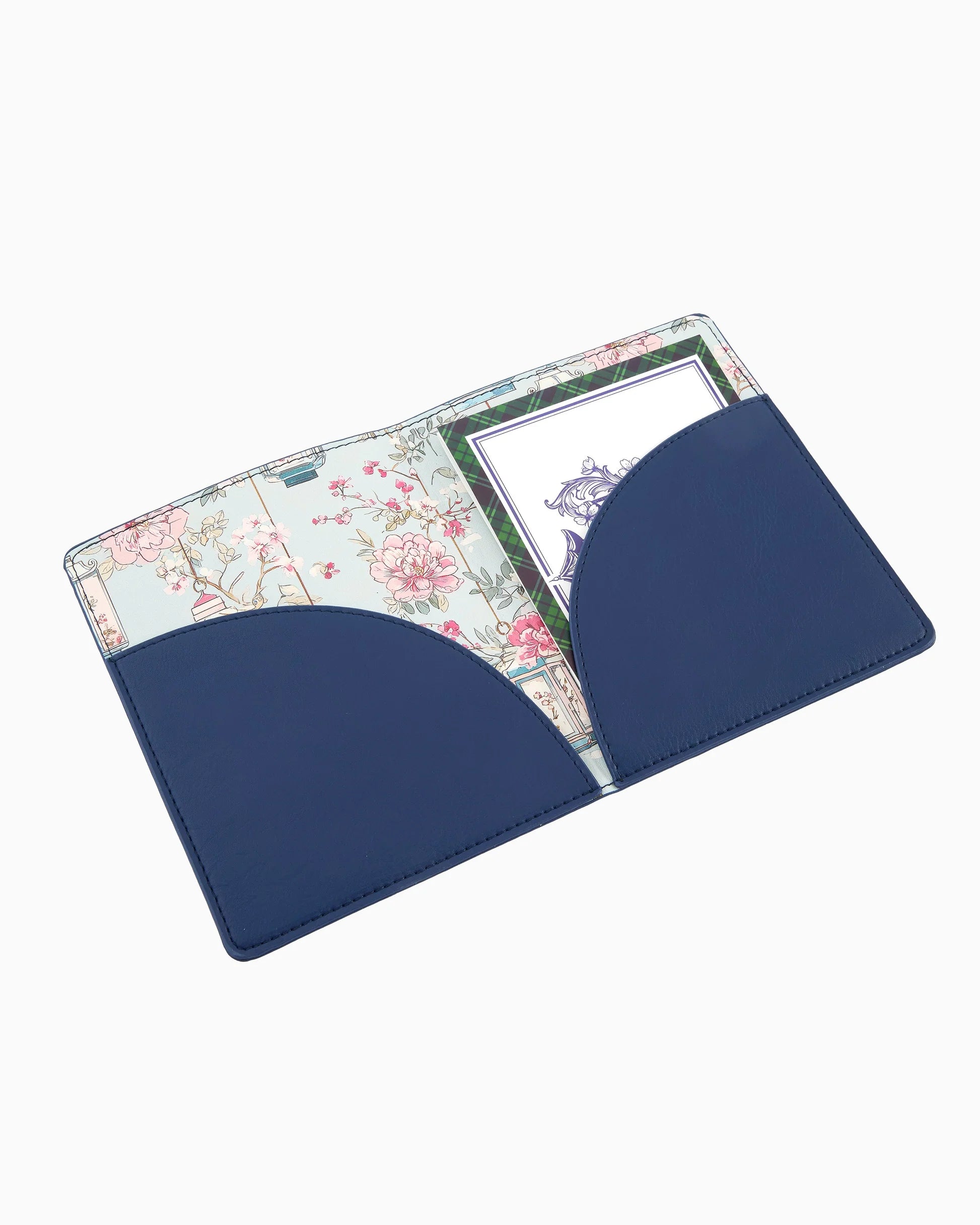 Navy blue cardholder with floral design on a white background