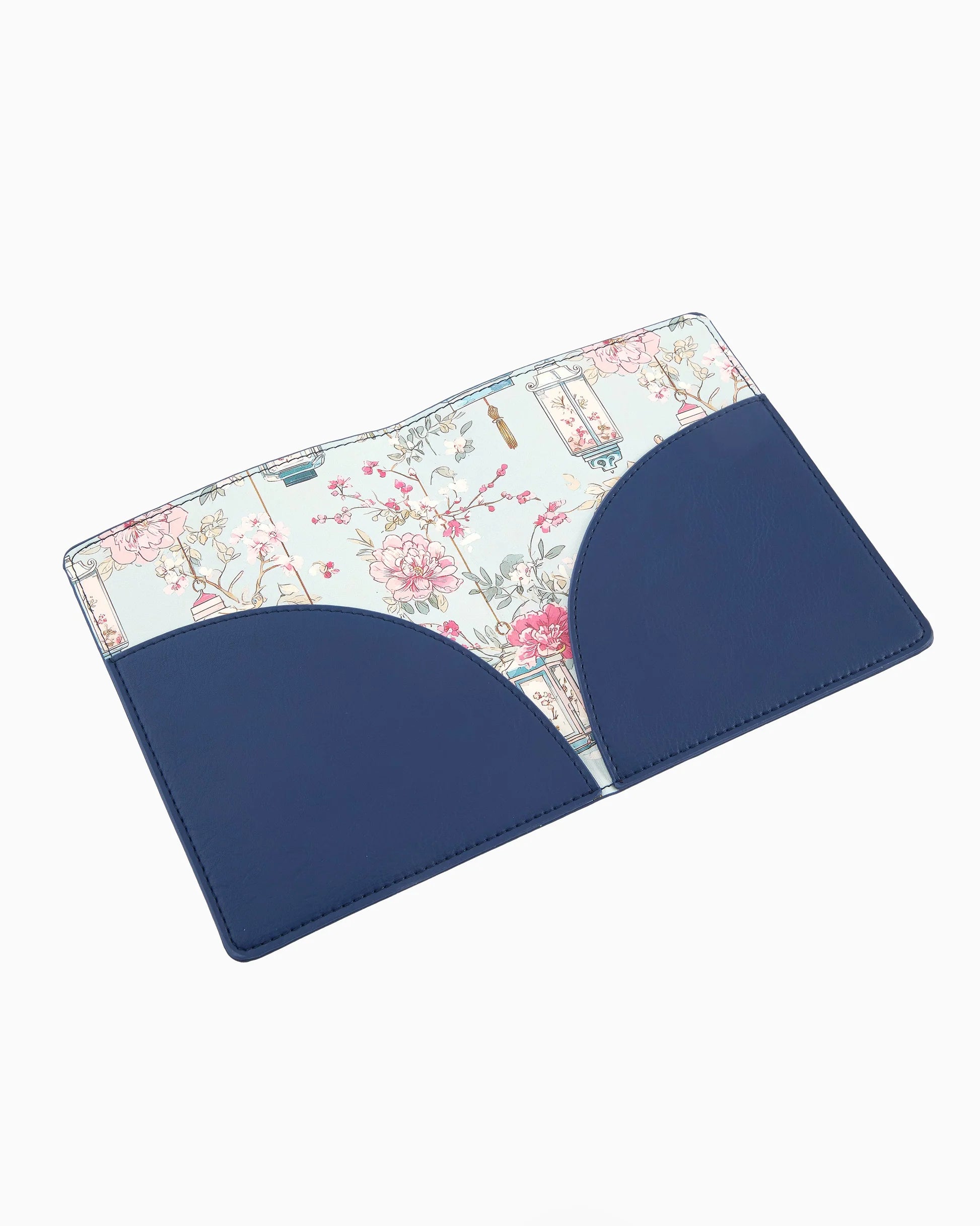 Navy blue and floral-patterned pouch on a white background