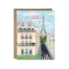 Greeting card with Parisian street scene and Eiffel Tower, featuring 'Happy Birthday' text.