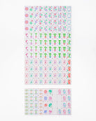 Set of small stickers with various designs on a white background