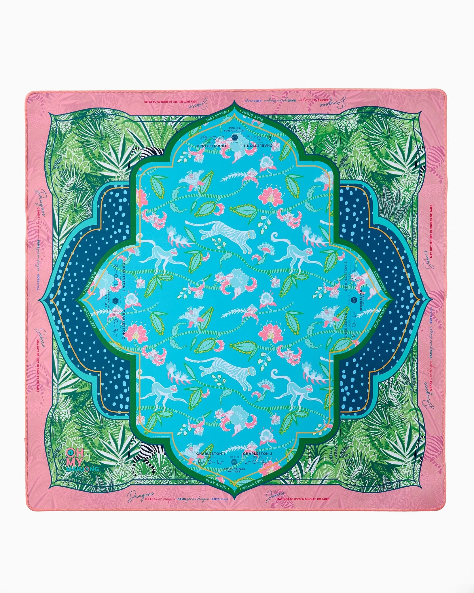 Decorative blanket with a colorful pattern on a pink background