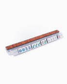 A mahjong set displayed in a clear plastic rack, showing the back of the tiles with reddish-brown wood-grain tops and the front of the tiles with white faces and colorful symbols, on a plain white background.