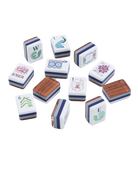 A set of Mahjong tiles arranged on a plain white background, showing both the white faces with printed symbols and the wood-grain backs.