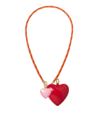 Necklace with heart-shaped pendants on an orange cord against a white background