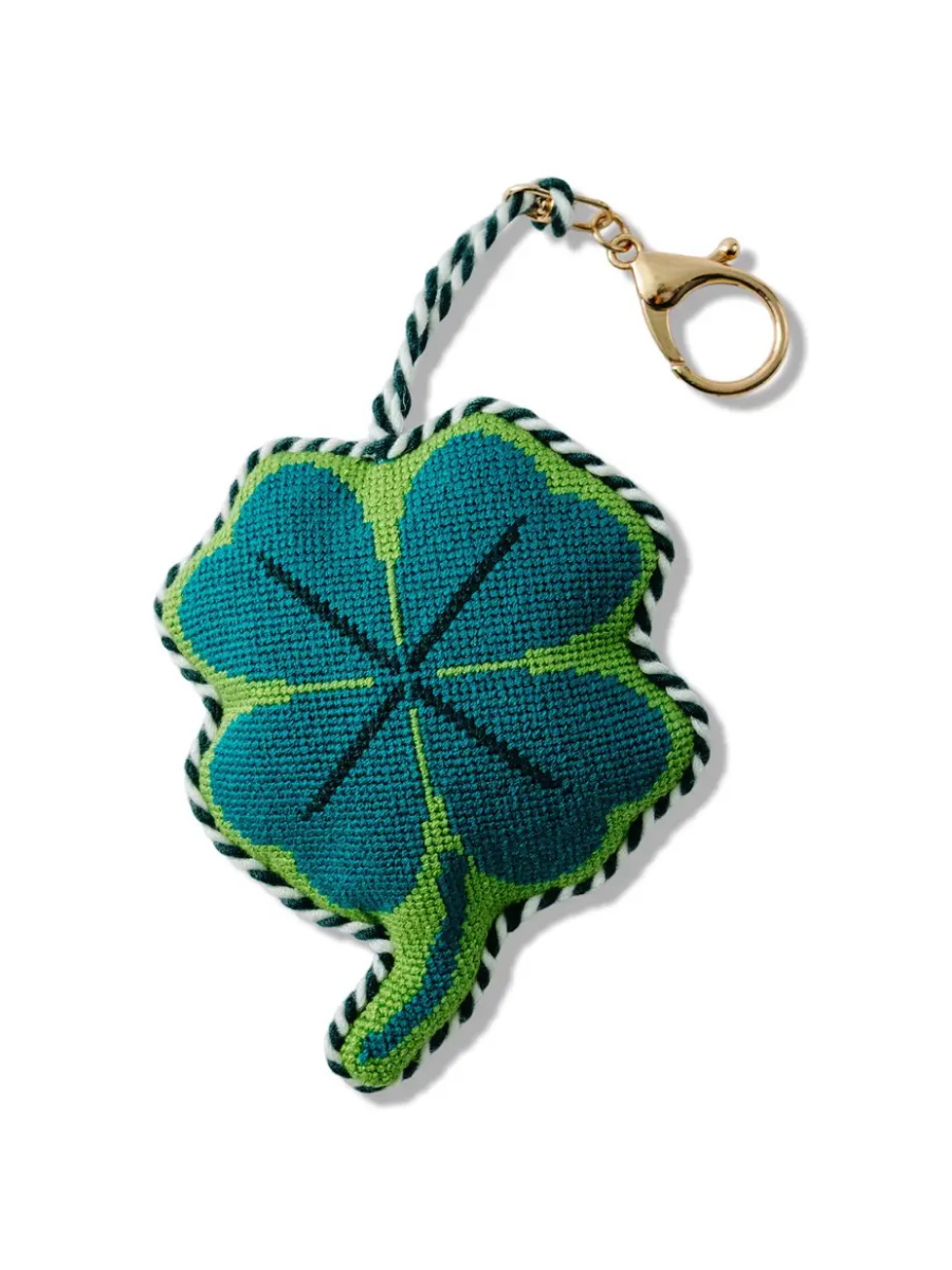 Four-leaf clover keychain with green and blue design on a white background