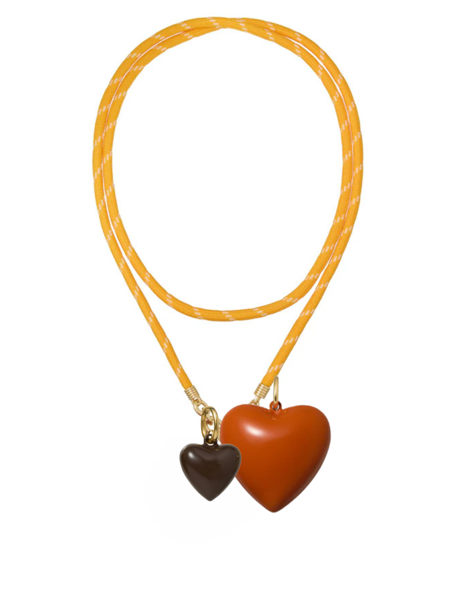 Necklace with two heart-shaped pendants on a white background